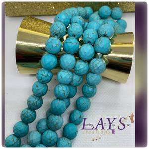 10mm faceted synthetic blue turquoise bead strand